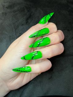 Bright Green Halloween Nails, Green And Purple Nails Halloween, Alien Nail Art Design, Halloween Nails Green And Black, Halloween Neon Nails, Frankenstein Nail Designs, Green And Black Nail Ideas, Lime Green Halloween Nails, Neon Green Halloween Nails