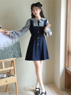 Faux two-piece pinafore blouse dress with a scallop collar, button front and mini twirl skirt. Concealed back zipper with waist ties. S: 14" across shoulders, 35" chest, 28" waist, 32" lengthM: 14.5" across shoulders, 36.5" chest, 29.5" waist, 32" lengthL: 15" across shoulders, 38" chest, 31" waist, 32" length Scallop Collar, Twirl Skirt, Collared Dress, Overall Dress, Sweater Blouse, Art Stuff, Outfits Ideas, Cardigan Jacket, Collar Dress