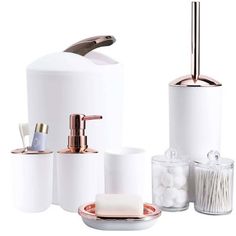 bathroom accessories including soap dispenser and toothbrush holder