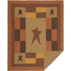 a brown and tan quilt with stars on it's side, in the center