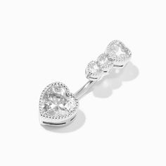 an open heart shaped diamond ring on a white background