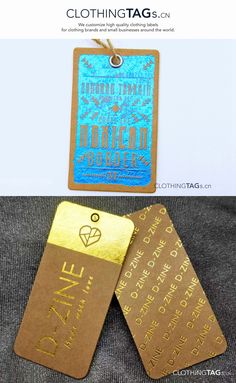 two tags with gold foil on them, one is blue and the other is brown