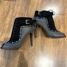 These Are In Great Condition! Black Suede, Lace Up Calf Boot With Metal Clasp Close To The Top. Foot Beds And Heels Are Like New. Some Light Scuffing On The Sole Consistent With Light Wear. 4.5 Inch Heels Each Shoe Is Missing 1 Tiny Stud. See Pics For Details. Purchased At Bergdorf's For $1485. Comes With Original Box - No Bag. Studded Open Heel Party Heels, Glamorous Leather Heels With Studs, Glamorous Studded Leather Heels, Party Boots With Reinforced Open Heel, Black Open Toe Heels With Studs, Studded Round Toe Evening Heels, Studded Round Toe Heels For Evening, Evening Heels With Studs And Round Toe, Chic Party Boots With Open Heel