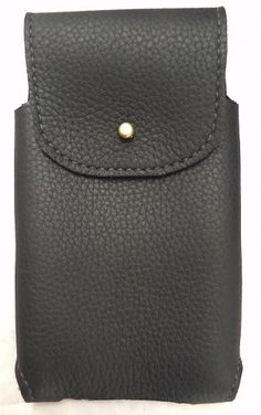 a black leather case with a gold button on it's front pocket for a cell phone