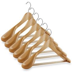 four wooden hangers are hanging on a metal rack with the words casafield