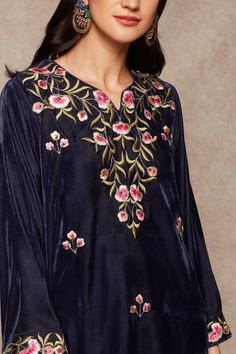 Navy blue kurta with floral embroidered motifs. Paired with velvet floral embroidered salwar.
Component: 2
Embroidered
Neckine: Notched
Sleeve Length: Three quarter
Fabric: Velvet
Color: Blue
Floral motif work
 - Aza Fashions Navy Blue Kurta, Velvet Kurta, Embroidered Salwar, Blue Kurta, Embroidered Motifs, Velvet Color, Fashion App, Blue Velvet, Set For Women