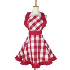 a red and white checkered dress on a mannequin