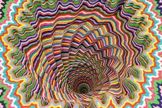 an abstract painting with multicolored lines in the shape of a spiral, on a white background