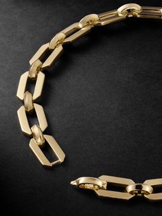 SHAY's chain bracelet is a sleek take on classic styles. It’s cast from polished gold and made up of flat geometric links. Luxury Link Bracelet With Chunky Chain, Timeless Gold Link Bracelet With Polished Finish, Modern Cable Chain Bracelets For Formal Occasions, Timeless Polished Chain Link Bracelet, Modern Gold-tone Chain Bracelet For Formal Occasions, Luxury 14k Gold Chain Bracelet With Rectangular Links, Luxury Chunky Chain Link Bracelet, Formal Polished Link Chain Bracelet, Modern Yellow Gold Chunky Chain Jewelry