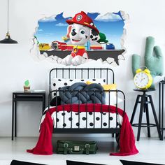 a bedroom scene with the paw patrol wall decal