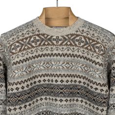 A great example of classic Fair Isle design. Fair Isle is a knitting technique that takes its name from a tiny Shetland island and creates multicolor geometric patterns, knitted in rows. It was popularized by the Duke of Windsor and has become a traditional cold weather knit. Details 100% authentic Shetland wool, spun on the island 2-ply wool yarns; traditional Fair Isle design Ribbed collar, cuffs and hem Knitted and hand-linked on the Shetland Islands, Scotland Size & Fit Fits slim; consid Shetland Islands Scotland, Duke Of Windsor, Shetland Islands, Vintage Knitwear, Island 2, Shetland Wool, Fair Isle Pattern, Fair Isle Sweater, Buckwheat