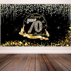 a black and gold 70th birthday party backdrop