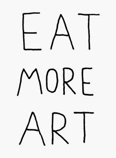 the words eat more art written in black ink