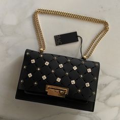 Nwt - Zac Posen - Eartha Medium Chain Shoulder Bag - Black - Leather - Gold Chain - Protective Sticker - No Dust Bag Or Box Luxury Shoulder Bag With Gold Chain For Party, Luxury Evening Bags With Gold Chain, Luxury Black Shoulder Bag With Gold Chain, Luxury Bags With Gold Chain For Party, Designer Evening Shoulder Bag With Chain, Designer Shoulder Bag With Chain Strap For Evening, Designer Evening Bags With Chain Strap, Elegant Party Bags With Branded Hardware, Luxury Evening Bag With Chain Strap For Night Out