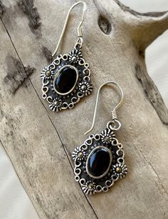 Very pretty and unusual sterling silver pierced earrings with onyx stones. I love the sweet design around the stones. Vintage Silver Onyx Jewelry, Ornate Oval Pierced Earrings, Silver Onyx Drop Earrings, Ornate Black Sterling Silver Jewelry, Ornate 925 Stamped Silver Dangle Earrings, Black Bohemian Pierced Jewelry, Black Bohemian Sterling Silver Earrings, Black Ornate Dangle Jewelry, Ornate Oval Sterling Silver Earrings