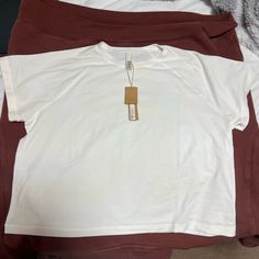 Can Fit Xl Comfortable Crew Neck Sports Top, Casual Moisture-wicking Relaxed Fit Top, Casual Moisture-wicking Tops With Relaxed Fit, Comfortable Fit White Short Sleeve Top, White Comfortable Fit Short Sleeve Top, White Comfortable Fit Athleisure Top, White Comfortable Athleisure Top, Boho Crop Tops, Strap Crop Top