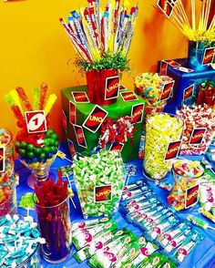 a table filled with lots of candy and candies