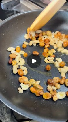 the food is being cooked in the pan on the stove top and ready to be eaten