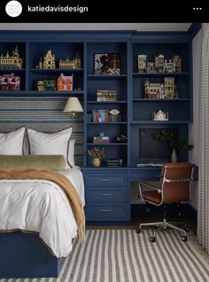 a bedroom with blue bookcases and a bed in the middle is decorated with striped carpet