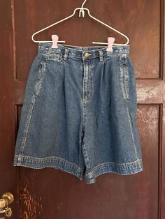 The absolute cutest vintage denim tailored shorts.  These 90's mom shorts are perfect for summer and the summer/fall transition.  They could be styled so many ways from preppy to minimalist to coastal grandma to granola core.   They will be a staple in your wardrobe!  Brand: Liz Claiborne Lizwear Size:  tag cut out- see measurements for best fit!  Waist: 29"  length: 19.5" inseam: 8" #momshorts #tailoredshorts #denimshorts #highwaistedshorts #retro Cheap Vintage Medium Wash Shorts, Medium Wash High-waisted Bermuda Shorts With Pockets, High Waist Medium Wash Cotton Bermuda Shorts, Retro High Waist Jean Shorts For Summer, Retro High-waist Jean Shorts For Summer, Trendy Bermuda Jean Shorts, Trendy Cotton Bermuda Jean Shorts, Medium Wash Bermuda Cotton Jean Shorts, Medium Wash Bermuda Jean Shorts