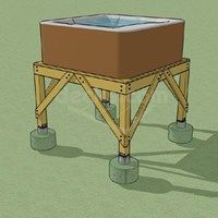 an image of a wooden structure with a hot tub on it's legs and the top section missing