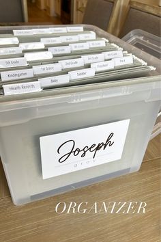 a plastic container filled with lots of name tags