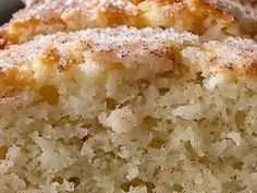 a close up view of some type of cake with powdered sugar on the top