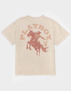 Playboy Cowgirl Arch Boxy Tee. Logo Screened On Chest. Large Graphic On Back. Boxy Fit. Crew Neck. Short Sleeve. 100% Cotton. Machine Wash. Imported. Western T Shirts, Boxy Tshirt, Western Tshirt, Overalls Boys, Chino Pants Women, Wwe T Shirts, Flannel Sweatshirt, Graphic Trends, Cowgirl Shirts