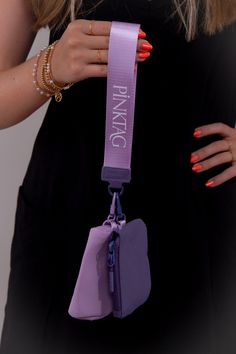 The Two Pouch PinkTag Wristlet is the perfect addition to your purse collection! This easy-style wristlet pairs perfectly with any outfit and has a thick matching wristlet strap. Perfect for the girl on the go! Pouch dimensions: 4.5" x 0.2" x 2.8" Zipper Closure Colors may vary with different viewing devices. Purse Collection, Neoprene Bag, Backpack Organization, Wristlet Pouch, Sneakers And Socks, Easy Style, Purple Lavender, Accessories Bags Purses, Wedge Sneakers