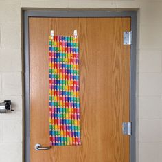 the door is decorated with multicolored paper