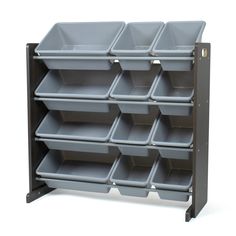 a shelf with many bins on it