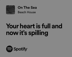 the spotify logo and spotify's homepage on the sea beach house