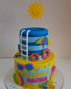 a birthday cake decorated with an image of a lifeguard tower and sun on top