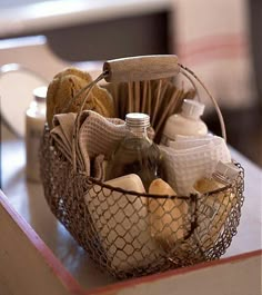 a basket filled with lots of items on top of a table