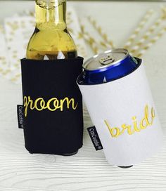 two can coolers sitting next to each other on top of a white table with gold confetti