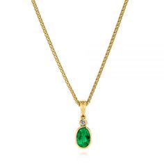 106030 14k Yellow Gold Pendant   1 Emerald - .44 ctw   1 Diamond - .03 ctw   Clarity: SI, Color: I   Chain 18''. This gorgeous pendant features an oval emerald gemstone with a small diamond accent placed in a yellow gold bezel setting. Classic Yellow Gold Emerald Necklace With Oval Pendant, Classic Yellow Gold Oval Emerald Necklace, Classic Oval Emerald Necklace In Yellow Gold, May Birthstone Oval Brilliant Cut Necklace, Oval Brilliant Cut May Birthstone Necklace, Brilliant Cut Oval May Birthstone Necklace, Brilliant Cut Oval Necklace For May Birthstone, Classic May Birthstone Necklace, Fine Jewelry Oval Emerald Necklace For May Birthstone