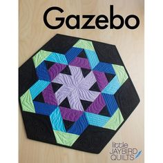 the cover of gazebo magazine features a quilted hexagonal design on it