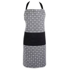 a black and white apron with geometric designs on it, the apron has two contrasting colors