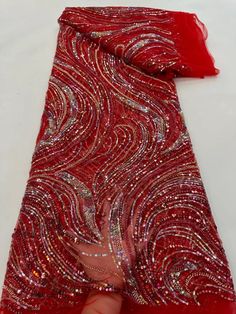 This high quality Fabric is measured in 5 Yards With Embroidered Beading and Sequin. It is soft, very delicate and beautiful. This high Quality Fabric is made with Fashion embroidered rhinestones can be used in making party wedding dresses, skirts, shawls, scarves and other other fashion apparels as you would like. Size : Length : 5 yards (180 inch). Width: 50 inch (Please allow slight deviation for the measurement data ,±1 inch) Material: 100% Polyester, Tulle Lace Fabric, Eco-Friendly embroide Red Embroidered Sequined Fabric For Wedding, Red Embroidered Wedding Fabric With Sequins, Elegant Red Embroidered Sequin Fabric, Elegant Red Embroidered Fabric With Sequins, Red Embellished Sequin Fabric For Wedding, Elegant Embellished Red Embroidered Fabric, Elegant Red Embellished Embroidered Fabric, Elegant Red Embellished Sequin Fabric, Red Sequined Embroidered Fabric For Party