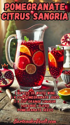 pomegranate citrus sangria with orange slices and limes in a pitcher