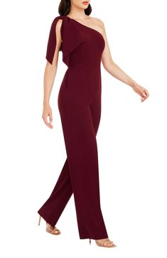 An elegant one-shoulder neckline and figure-skimming silhouette style a sophisticated jumpsuit with two panels that cascade over the single shoulder. 63 1/2" length; 34" inseam; 22 1/2" leg opening (size Medium) One-shoulder neck Sleeveless Lined 97% polyester, 3% spandex Dry clean Imported Elegant Solid Strapless Jumpsuit For Evening, One-shoulder Jumpsuits And Rompers For Evening, Formal Off-shoulder Jumpsuits And Rompers, Elegant Off-shoulder Solid Jumpsuits And Rompers, Elegant One Shoulder Jumpsuits And Rompers, Elegant One-shoulder Jumpsuits And Rompers For Work, Elegant One-shoulder Solid Jumpsuits And Rompers, Elegant Asymmetrical Evening Jumpsuits And Rompers, Evening Jumpsuits And Rompers With Asymmetrical Neckline