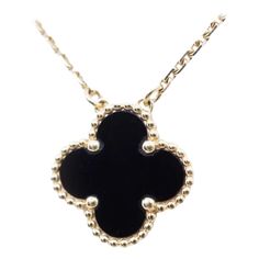 This classic Van Cleef & Arpels Necklace from the iconic Vintage Alhambra collection is crafted in 18k yellow gold and features 1 lucky clover motifs of 10.66 mm Pendant beautifully inlaid with black onyx in round bead settings. Made in France circa 2018. This is an authentic pair of VAN CLEEF & ARPELS 18K Yellow Gold Black Onyx Vintage Alhambra Necklace. The Pendant is crafted of 18 karat yellow gold and features clover motifs set with black onyx stones. Excellent condition. stamped VCA, AU 750 and # JE772879 Weight of the Earring 4.4 gm. 18 Inch long chain but have option of 16 inch also. Please take a look at my other pieces of jewelry and watches on 1st dibs FOLLOW MonalisaJewelry Inc. storefront to view the latest collection. Free Shipping with in United States We encourage you to tak Van Cleef Arpels Necklace Black, Vintage Alhambra Necklace, Van Cleef Arpels Necklace, Vintage Alhambra Pendant, Alhambra Necklace, Alhambra Pendant, Gold Vans, Van Cleef & Arpels, 1st Dibs