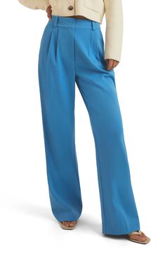 Carefully tucked pleats accent polished workday pants punctuated with elongating front seams and wide legs. 34" inseam; 22" leg opening; 13 1/2" front rise; 17 1/2" back rise (size 8) Zip fly with hook-and-bar closure Front slant pockets; back welt pockets 74% polyester, 22% rayon, 4% elastane Dry clean or machine wash, line dry Imported Blue Flare Pants Outfit, Favorite Daughter, Pleated Pants, Fall Wardrobe, Pants Outfit, Flare Pants, Wide Leg, Nordstrom, Wardrobe