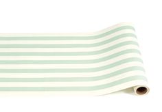 a roll of white and green striped paper