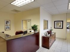 the front desk of an office is clean and ready for customers to come home from work