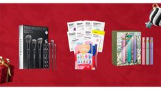 an assortment of makeup brushes and other items on a red background with a gift box