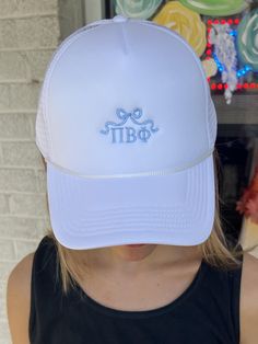 Perfect for Big/Little, New Members, and Sorority Gifts!  These embroidered hats are the ultimate must-have for elevating any outfit and repping your chapter! Product Specs: - 100% polyester - Five panel - Polyester foam front with mesh back - Thread Color: Light Blue **Because this design is approved by the sorority's headquarters, we cannot change the colors of the design or the hat **These items are MADE TO ORDER. Please allow for 7-10 business days from the day of placing your order due to production times for this item Message us about bulk orders!! ♡ Sorority Trucker Hats, Sorority Beanie, Sorority Hats, Sorority Accessories, Embroidered Bow, Sorority Merch, Go Greek, Pi Phi, Pi Beta Phi