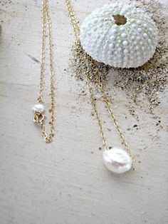 This is the perfect everyday necklace! you can pair it with your existing jewelry, layer it, and wear it day or night - casual or dressy! This necklace features a 9mm-10mm White Freshwater Keishi Pearl on your choice of Sterling Silver ($30) or 14k Gold-Filled ($35) chain. I paired a tiny white Simple Summer Jewelry For Gifts, Simple Summer Jewelry Gift, Minimalist Everyday Necklaces For Summer, Dainty Everyday Necklaces For Summer, Dainty Everyday Summer Necklaces, Minimalist Necklaces For Summer Gifts, Single Pearl Pendant, Pearl Gold Necklace, Floating Pearl Necklace