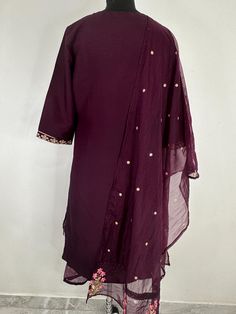 Product Details Burgundy embroidered Kurta with Trousers with dupatta Kurta design: Floral embroidered Straight shape * Regular style Round neck, three-quarter regular sleeves Zari detail * Calf length length with scalloped hem * Art Silk  fabric Trousers design: * Embroidered Trousers * Elasticated waistband * Slip-on closure Material& Care Kurta Fabric: Art Silk Bottom Fabric: Art Silk Dupatta Fabric: Organza hand wash  Items includes One piece Kurta One piece Dupatta One piece Trouser Note:- Please see the size chart in the image to choose a perfect size. Please feel free to ask any questions regarding this item WE ALSO ACCEPT CUSTOMISATION AS PER CUSTOMER REQUESTS. Festive Purple Churidar With Chikankari Embroidery, Long Sleeve Kurta With Dupatta In Chinon, Purple Resham Embroidery Kurta In Chinon, Purple Chinon Kurta With Resham Embroidery, Long Sleeve Chinon Kurta With Dupatta, Purple Chanderi Palazzo Set With Sheer Dupatta, Fitted Purple Churidar With Chikankari Embroidery, Embroidered Purple Palazzo Set With Straight Kurta, Purple Georgette Salwar Kameez With Straight Kurta