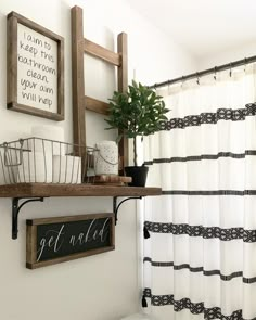 the bathroom is decorated in black and white